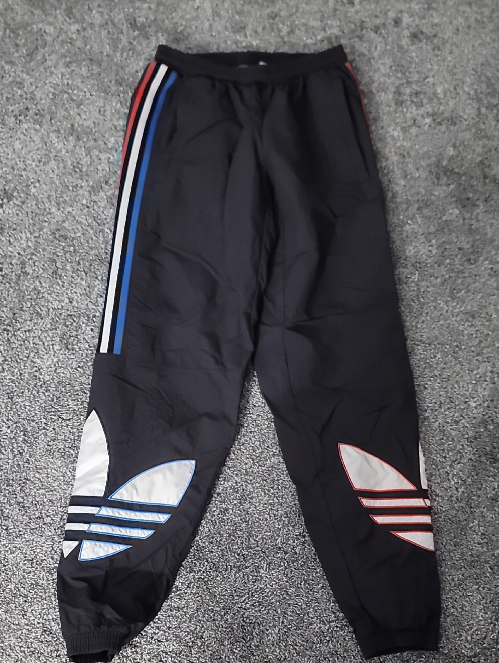 Kids Black Track Pants with Blue and Red Trim
